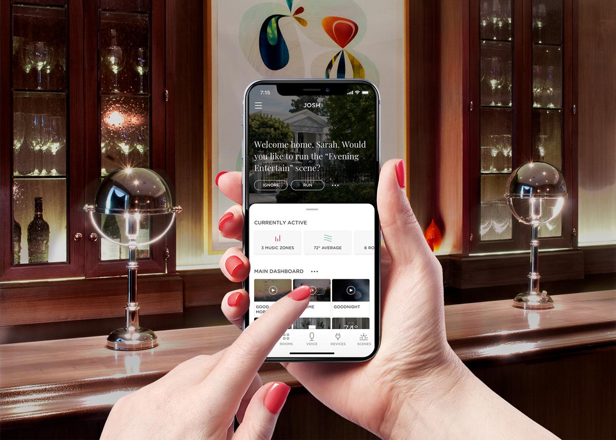 Person interacting with Josh AI app on cell phone