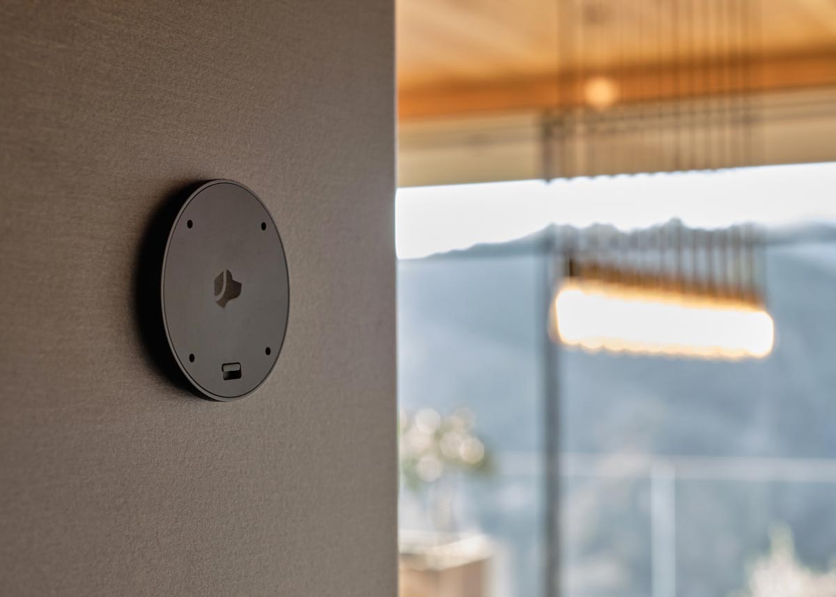 Josh Nano in black on wall