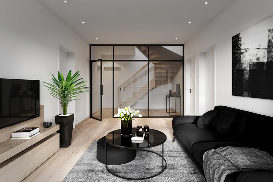 Recessed downlights illuminate a fireplace-centered living room