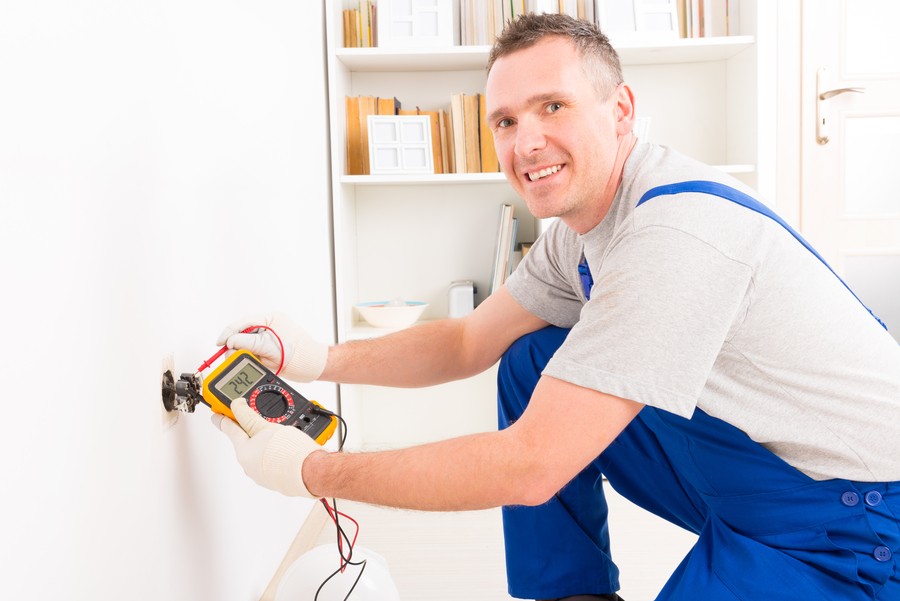 A professional low voltage contractor smiling at the camera. 