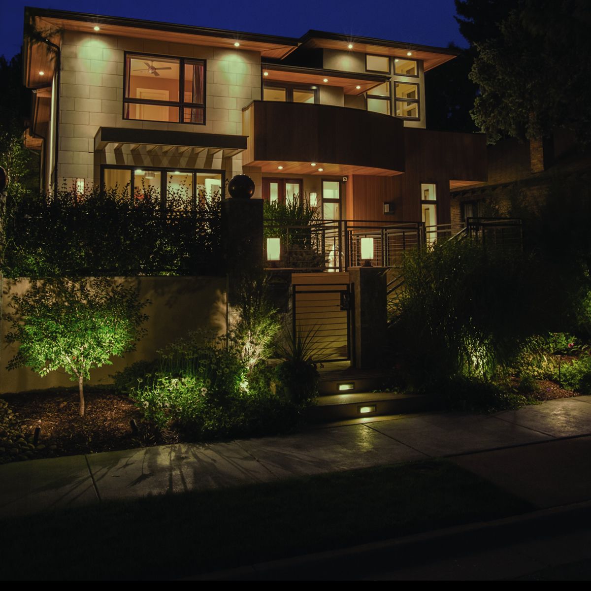 Home lit up at dusk